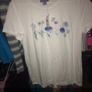 white top with floral graphic